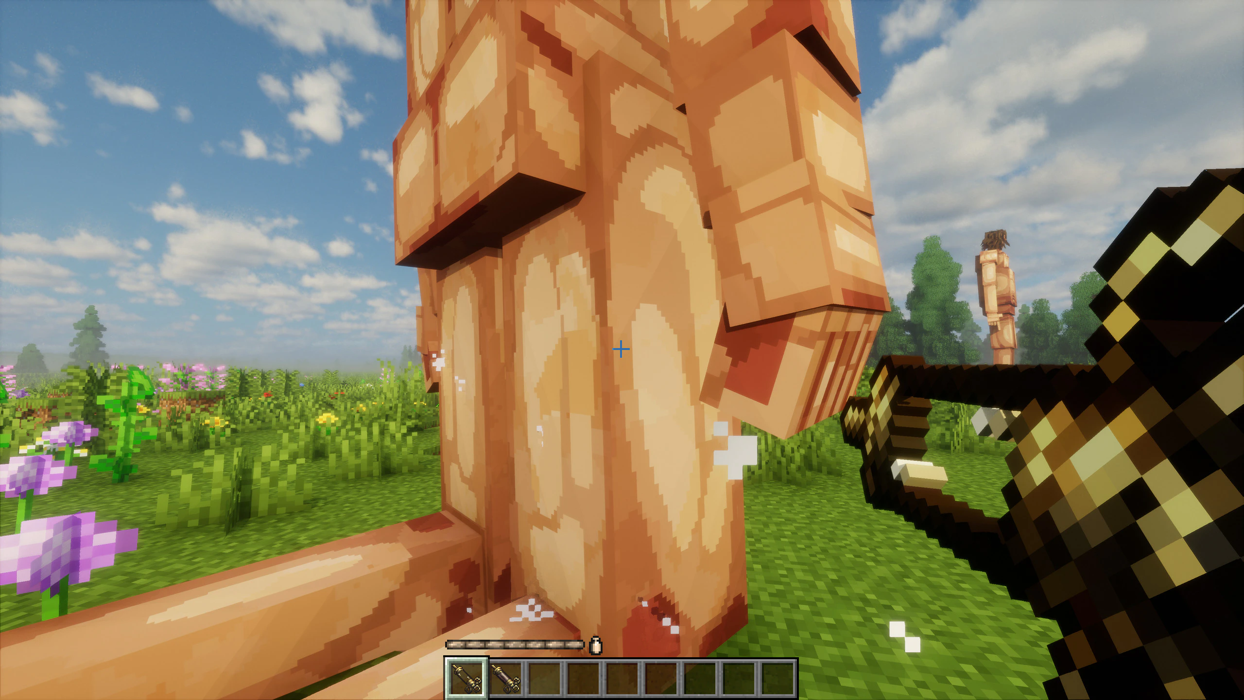 A player holding an Empty Syringe toward a Pure Titan lying on the ground, to draw its spinal fluid.